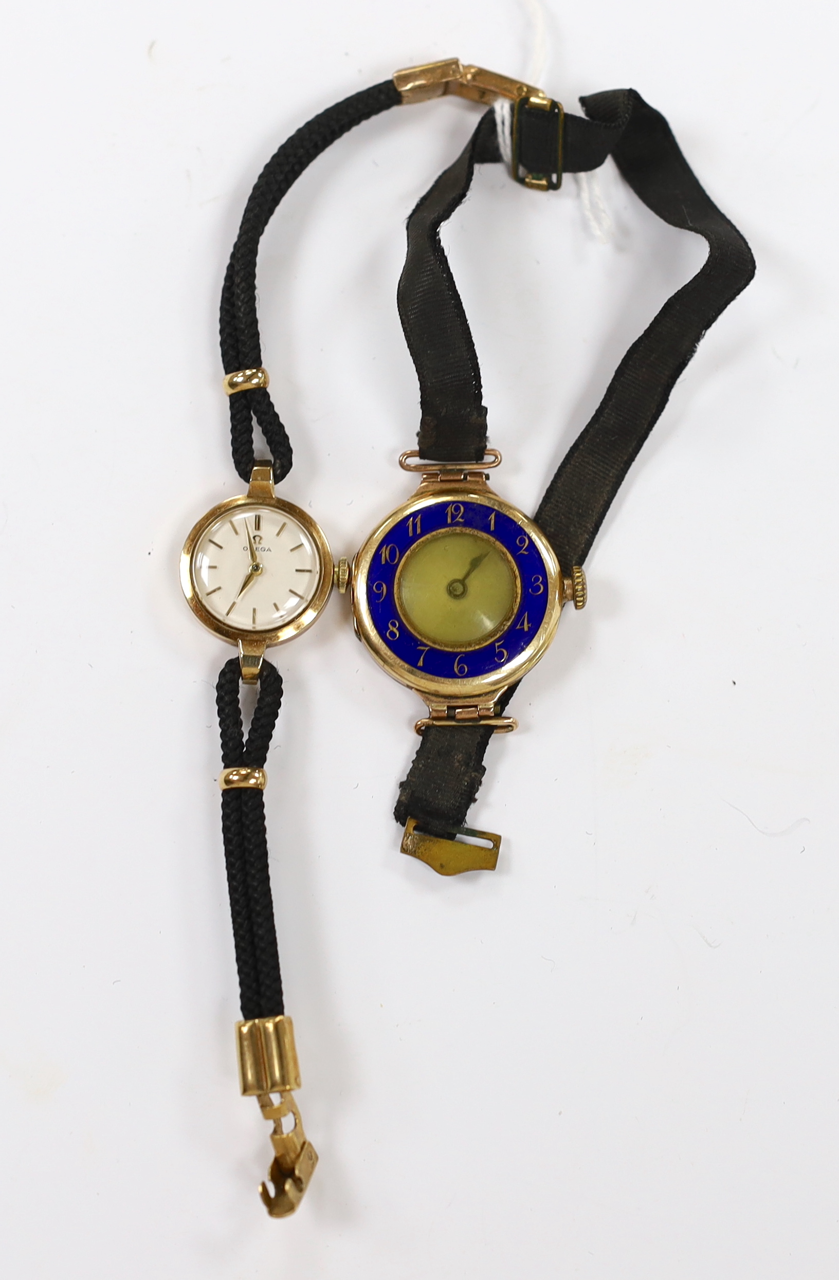 A lady's early 1960's 9ct gold Omega manual wind wrist watch, on a twin strand fabric strap, together with one other 9ct gold and enamel manual wind wrist watch.